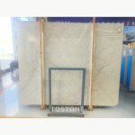 Full Sofitel Gold Marble slab with fine taupe veining concentrated toward the right and lower edges.