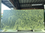 Verde Fantastico marble slab from Brazil with deep green and olive-gold natural veining