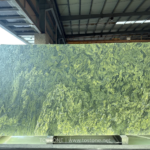 Verde Fantastico marble slab from Brazil with deep green and olive-gold natural veining