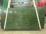 Brazilian Verde Fantastico marble slab showing olive-green highlights and natural markings