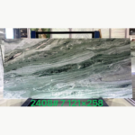 Victoria Green Marble slab with fine diagonal gray-green waves, pale accents and the original green image overlay.