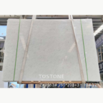 Vietnam Crystal White Marble slabs secured with lifting straps and green bands, with original inventory text