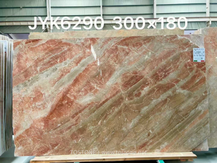 Weimi Pink marble slab with diagonal rose and pale grey-green bands
