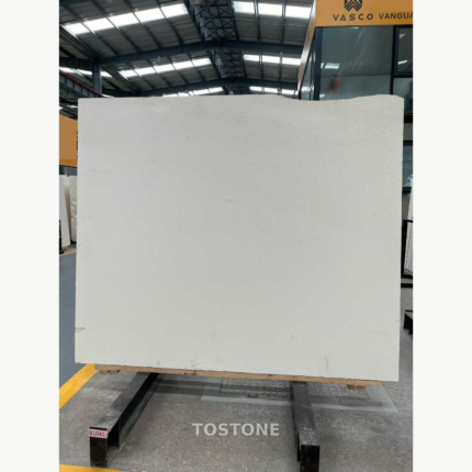 Full White Sand Beige Marble slab with an ivory-beige background, faint gray markings and an uneven upper edge.
