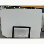 Wide White Sand Beige Marble slab with subtle cream shading and scattered fine gray specks.