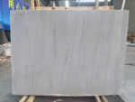 Front view of White Travertine Slab showing pale gray linear texture